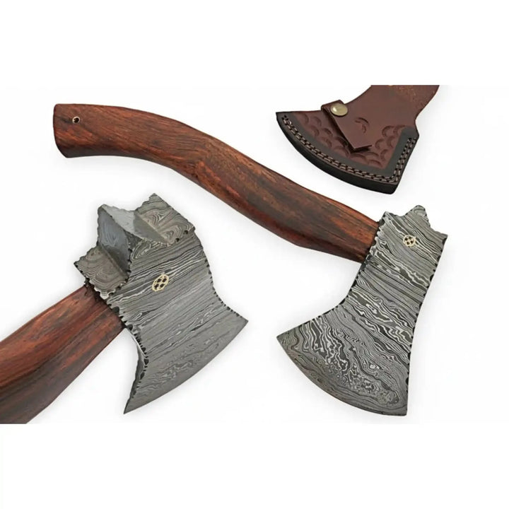 Decorative axe with wooden handle and detailed metal head on a white background