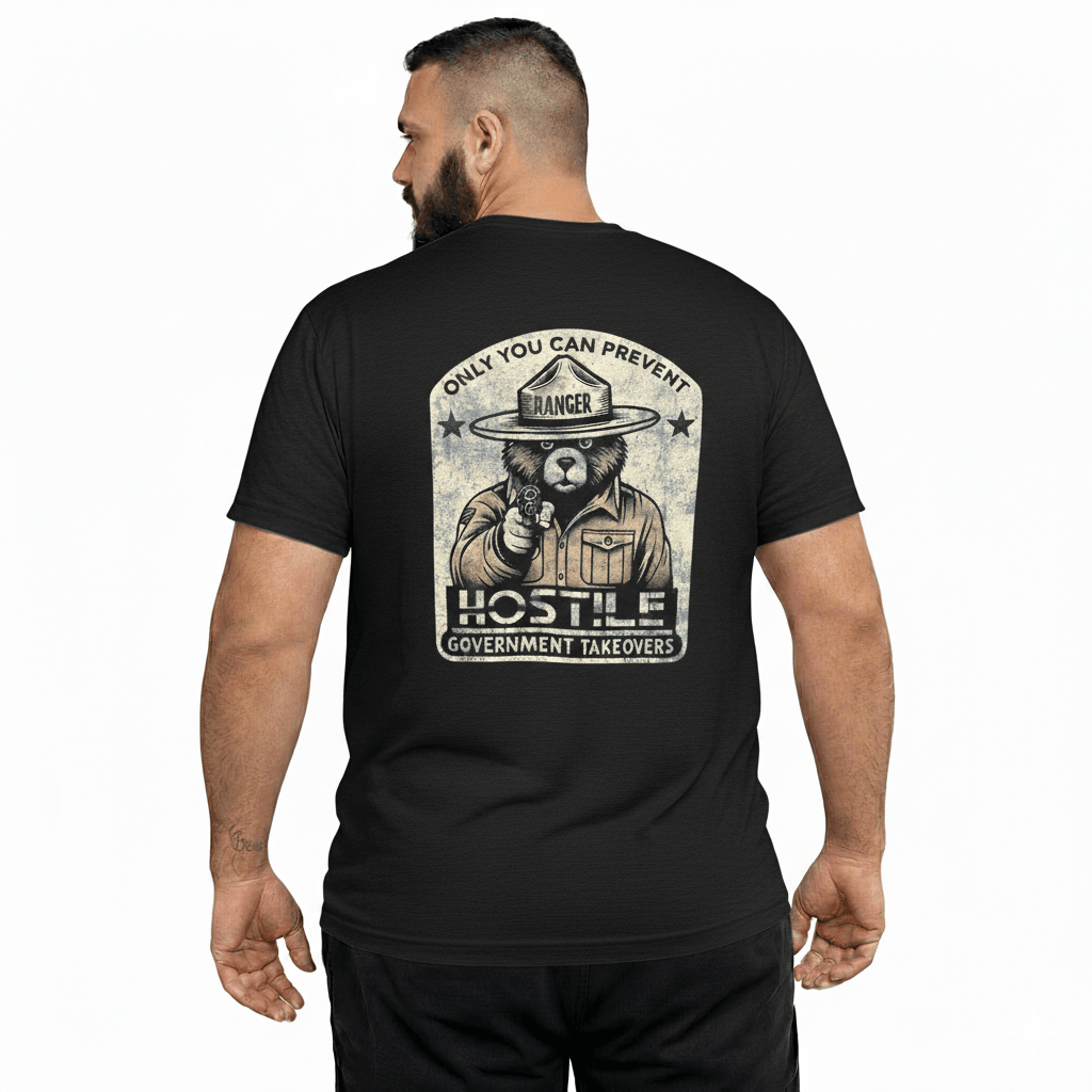 Man wearing a black t-shirt with a graphic design on the back, featuring text and an illustration of a person in a hat.