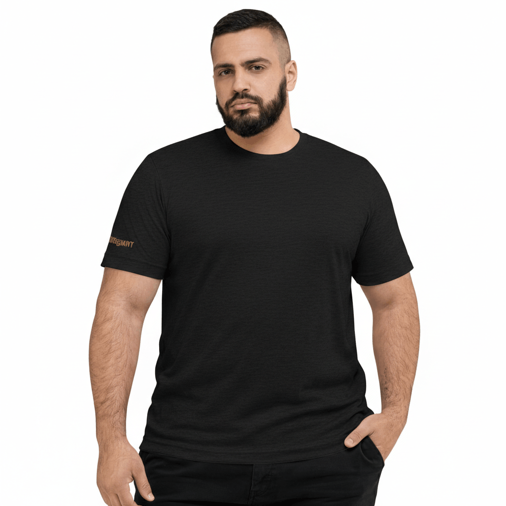 Man wearing a black t-shirt with a logo on a white background