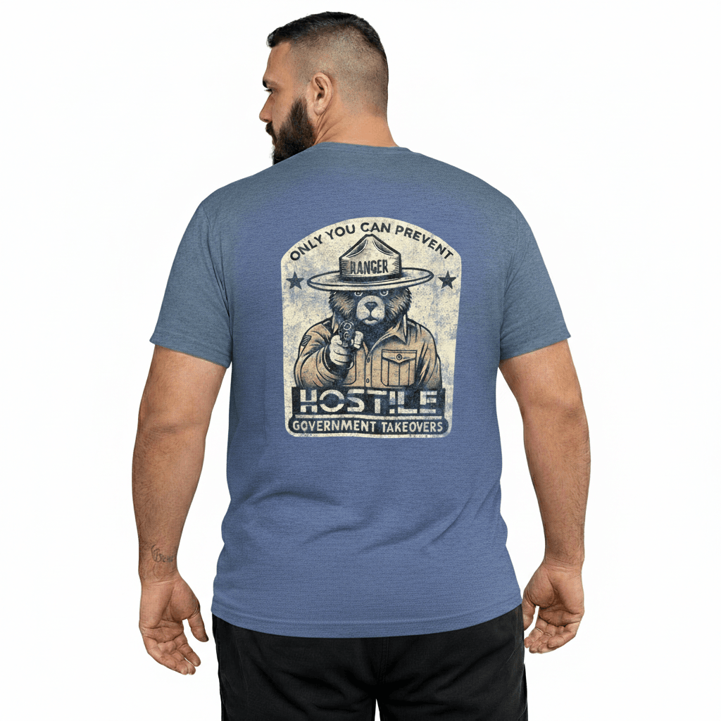 Man wearing a blue t-shirt with a graphic design on the back, featuring text and a bear illustration.