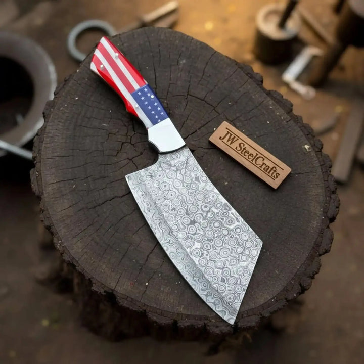 Cleaver knife with a decorative blade on a wooden block, branded 'JW SteelCrafts'.