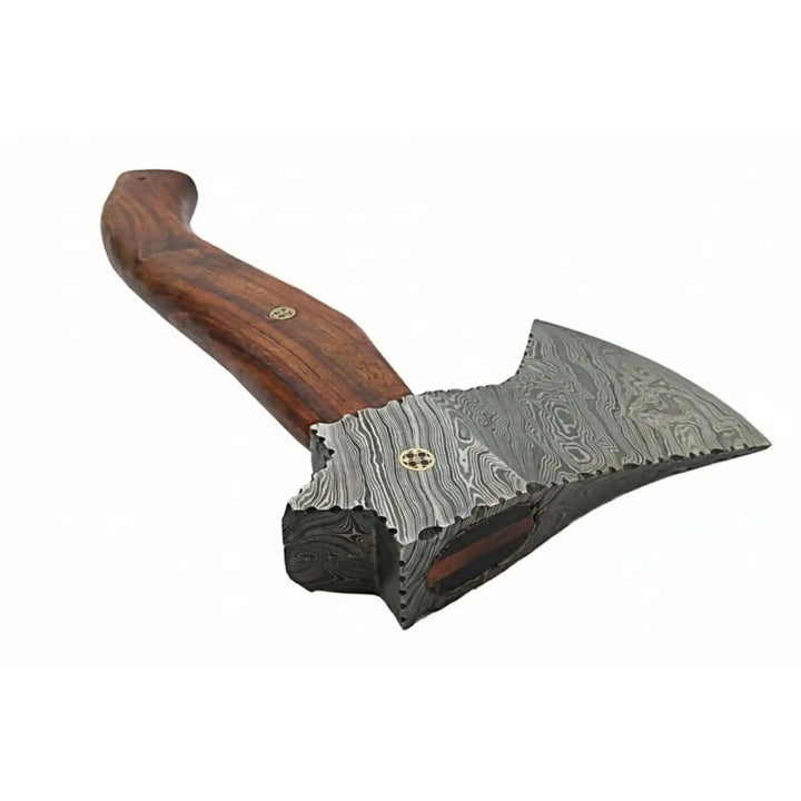 Wooden-handled axe with a decorative blade on a white background